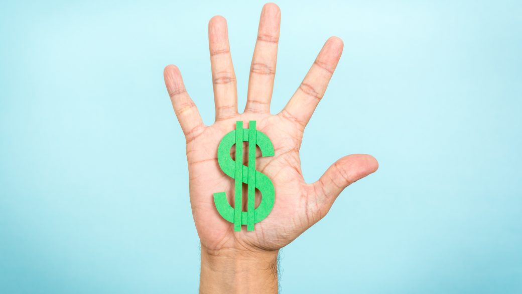 Hand up showing/catching a green dollar symbol with blue background.